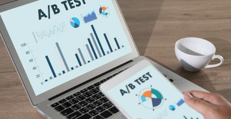 A/B test results on a laptop and phone