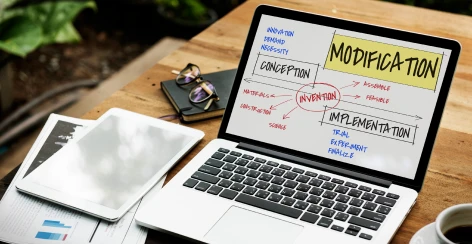 Laptop showing a planning mind map on a desk