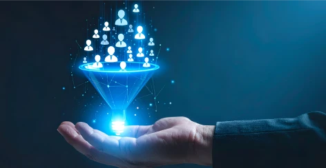 Hand holding a glowing funnel of lead contact icons