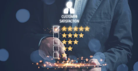 Hand selecting a five-star customer satisfaction rating
