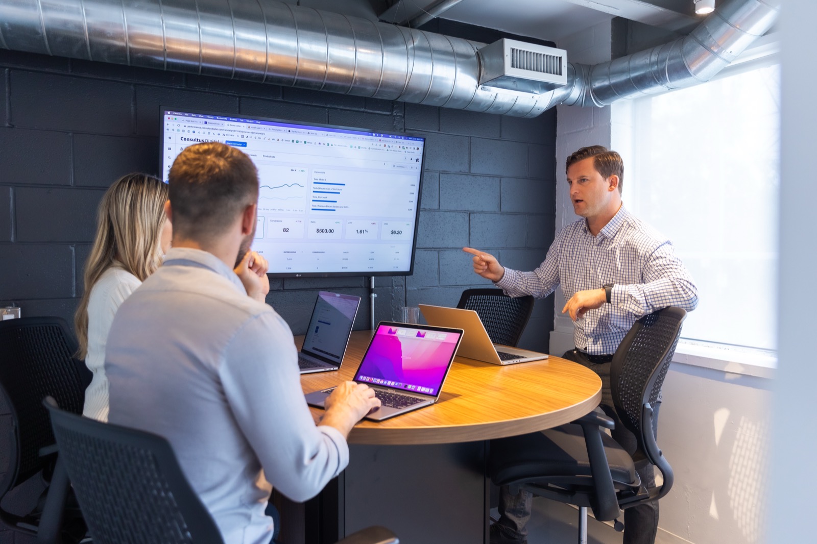 Consultus Digital team in a meeting room