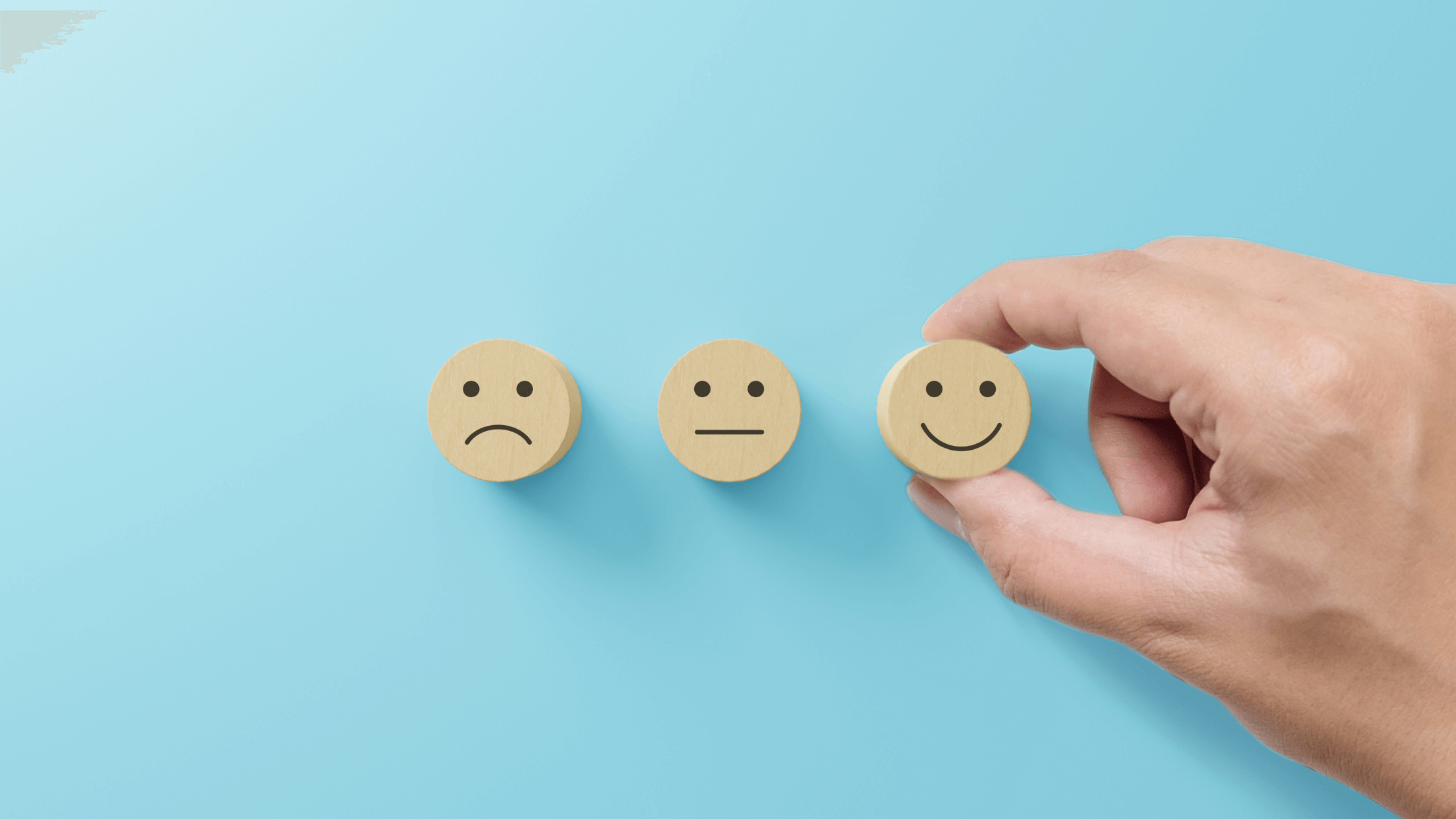 sad face neutral face and smiley face
