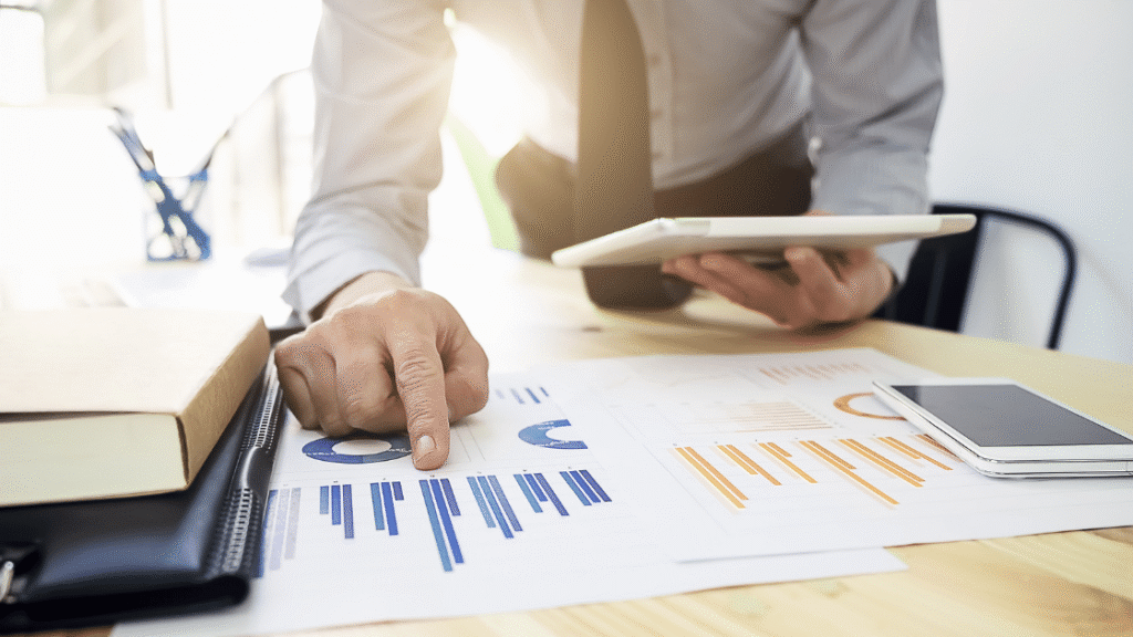 man pointing finger to google ads vs facebook ads performance metrics