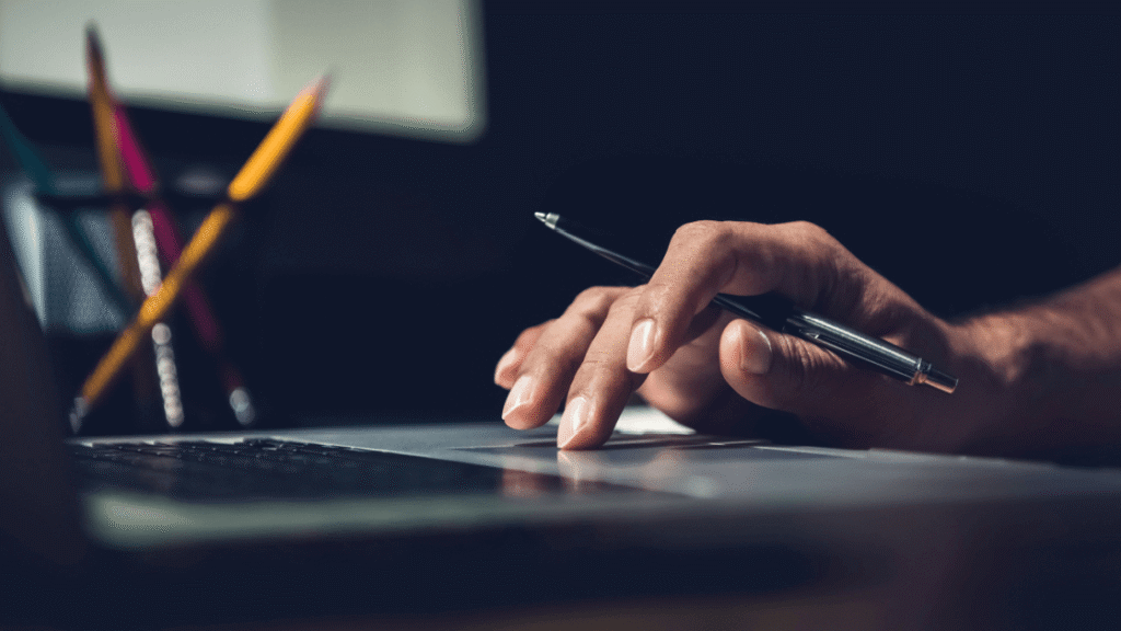 Hand over Macbook Pro keyword listing copywriting tips that will help with conversions