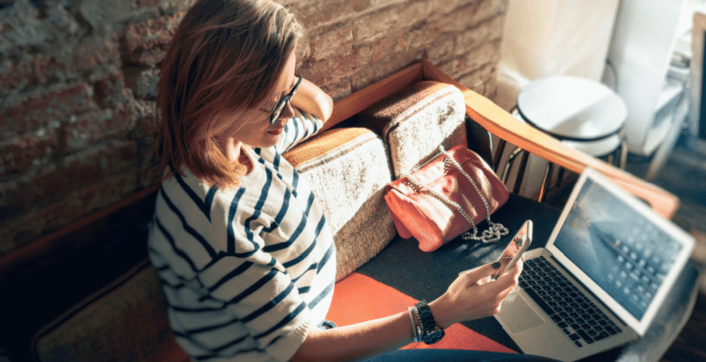 A woman reading a guest blog from Consultus content marketing strategy and feeling trust from the social proof associated with it. 