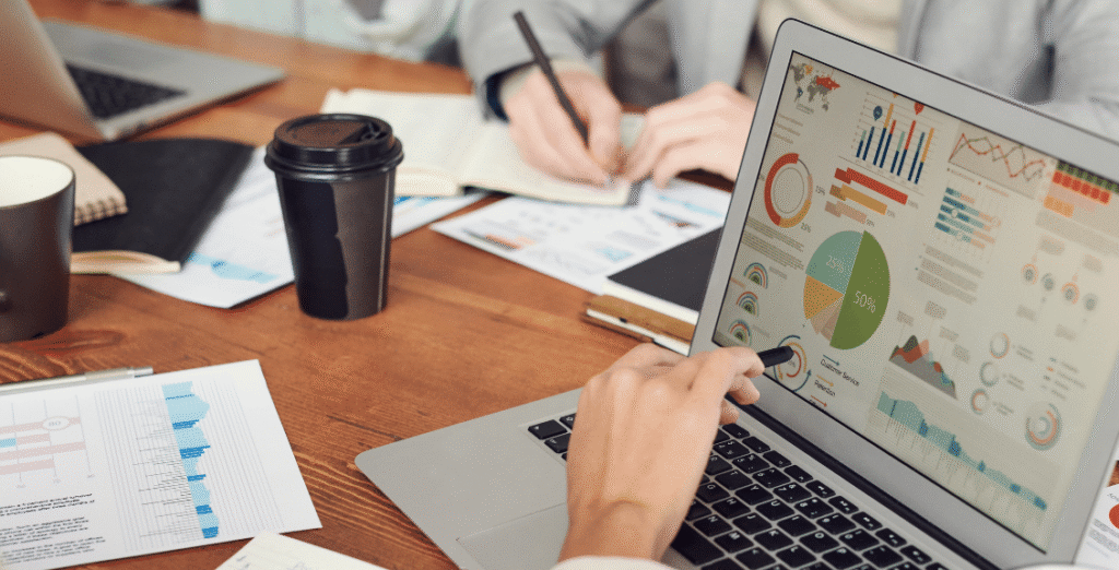 Digital marketer reviewing positive conversion rate optimization results on analytics tool