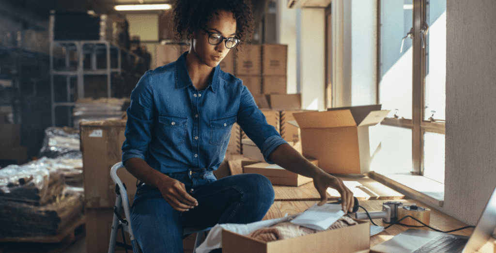 A female eCommerce store owner reviewing higher order numbers as a result of implementing CRO tips from Consultus Digital