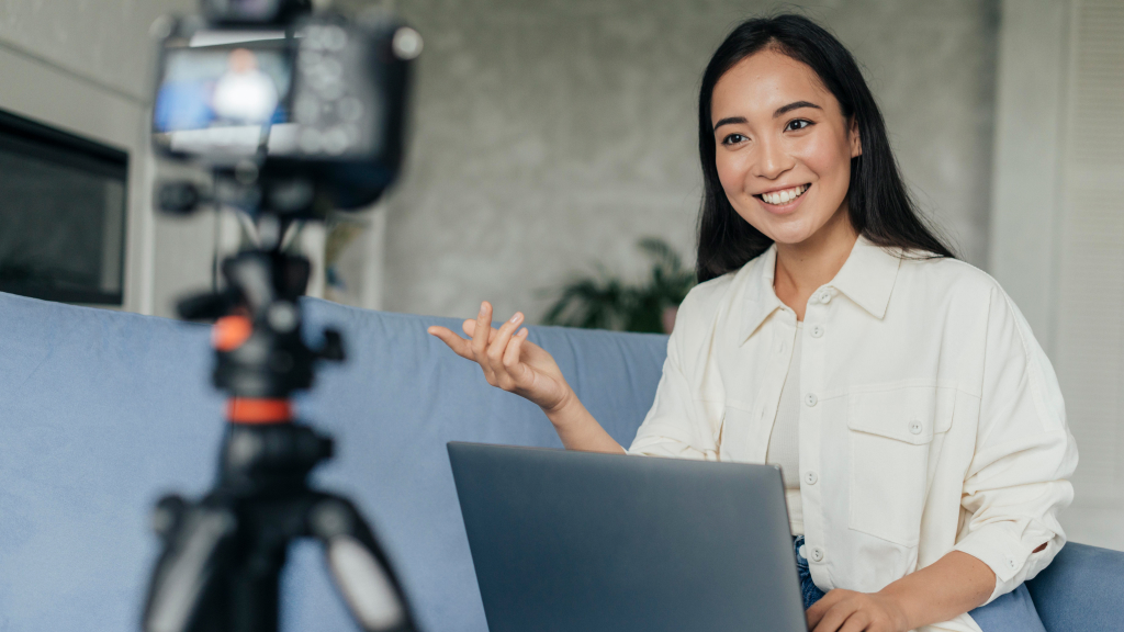 B2B influencer marketing - man hold and talking to a camera