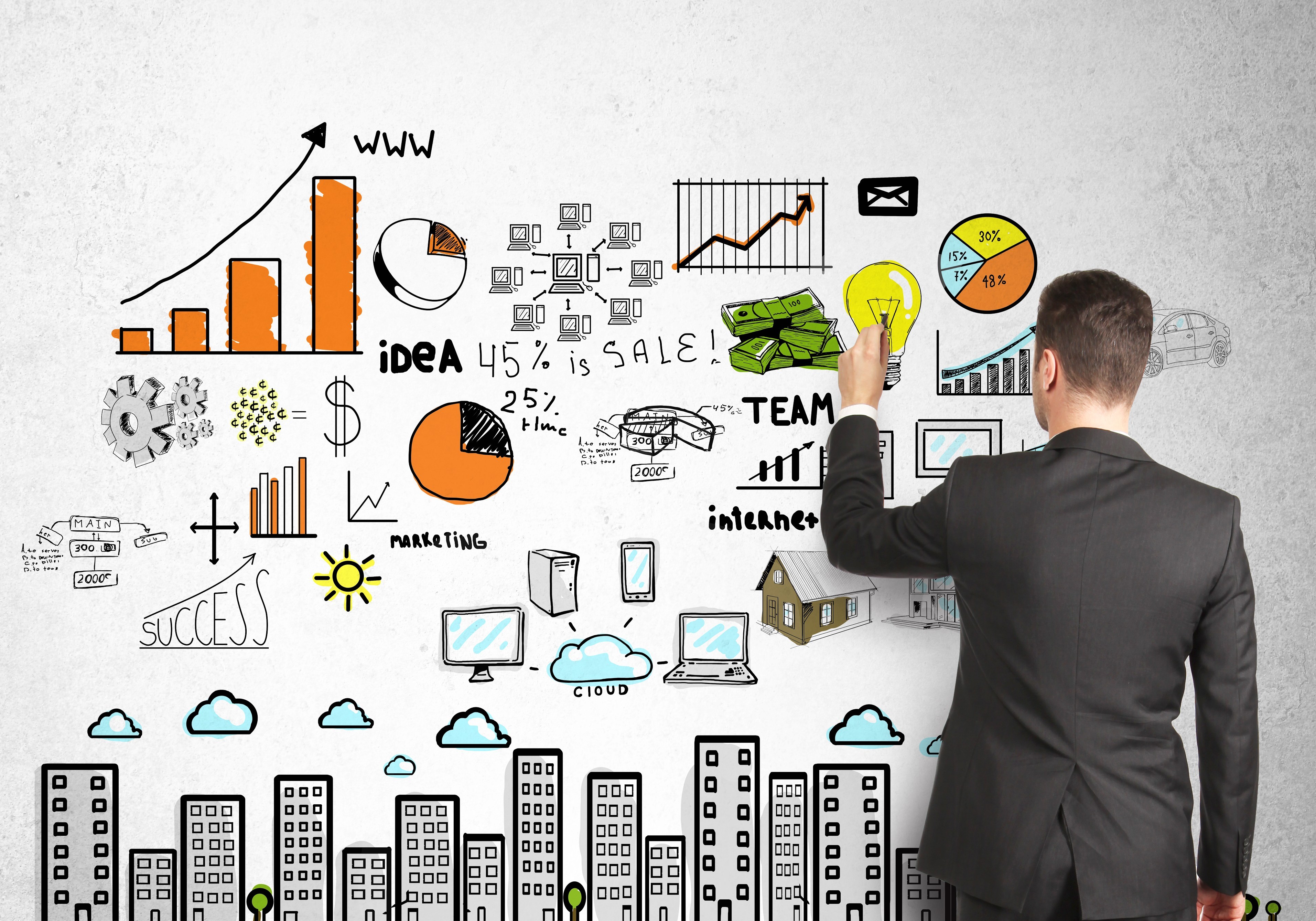 Man writing digital marketing tactics
