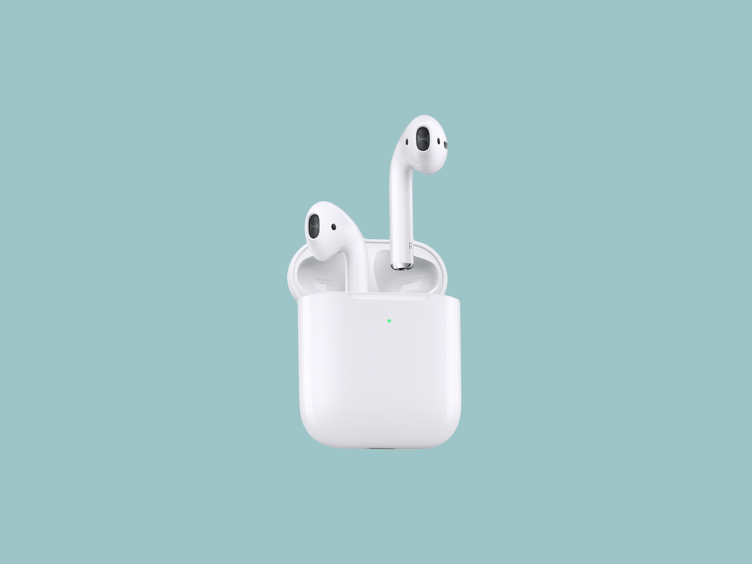 Apple AirPods on green background