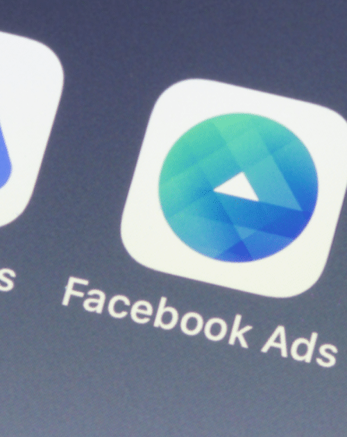 Google Ads vs Facebook Ads on Smartphone as Icons