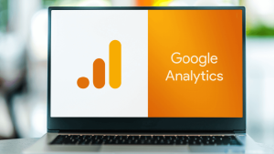 Macbook Pro screen displaying Google Analytics logo ready to migrate