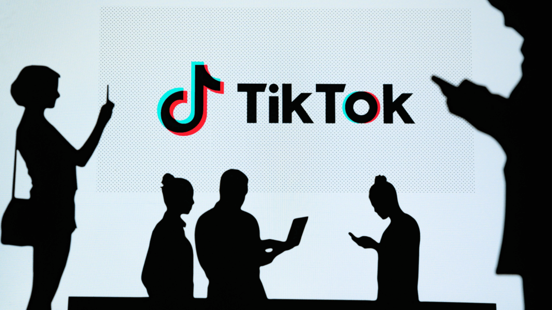 Three silhouettes of people converting into sales while they use Tiktok
